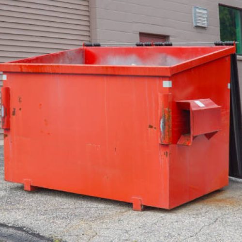large commercial dumpster for trash and recycling